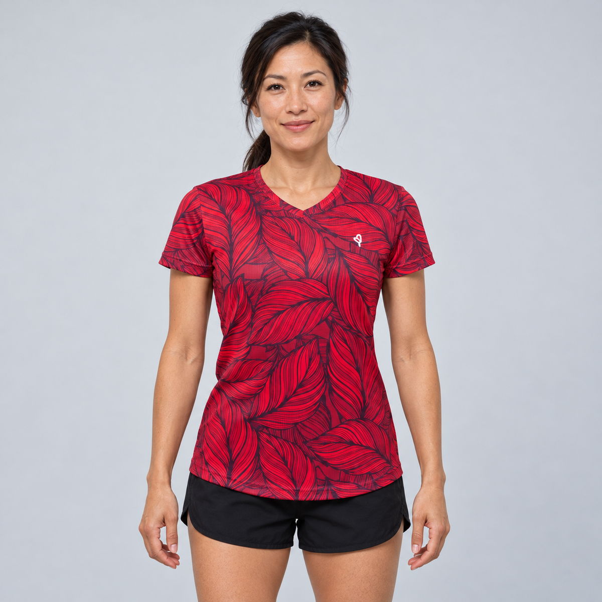 YUL Crimson Red women's running shirt, red and black, front studio view.