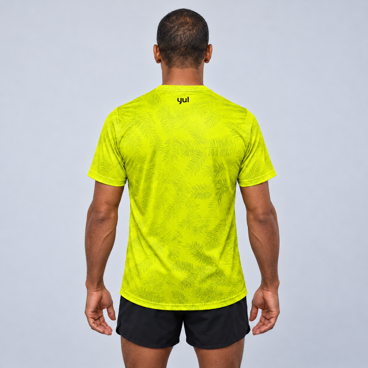 YUL Neon Radioactive Pine men's running shirt, neon yellow, back studio view.