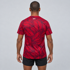 YUL Crimson Red men's running shirt, red and black, back studio view.