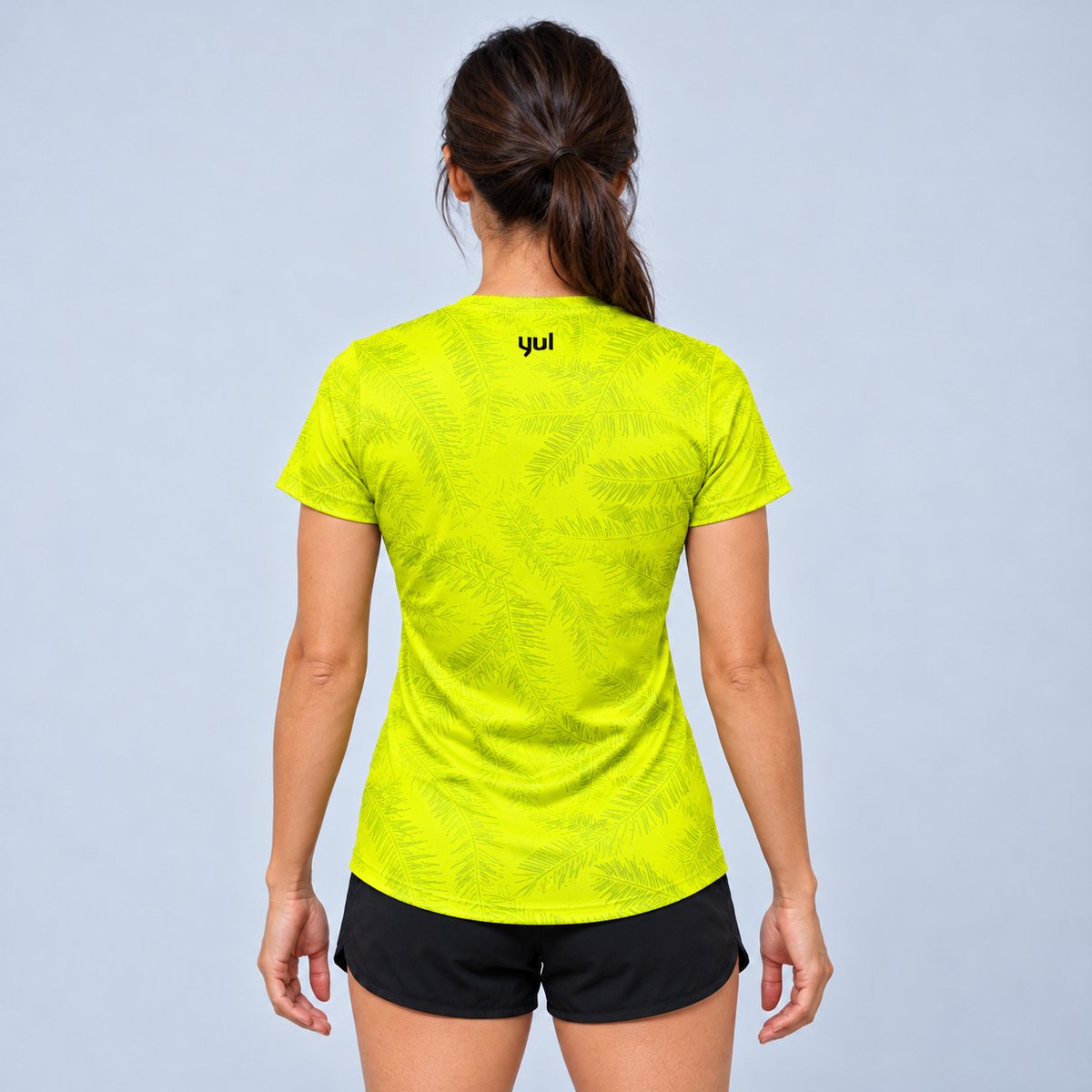 YUL Neon Radioactive Pine women's running shirt, neon yellow, back studio view.