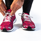 YUL Crimson Red road shoes, top view while tying the laces.