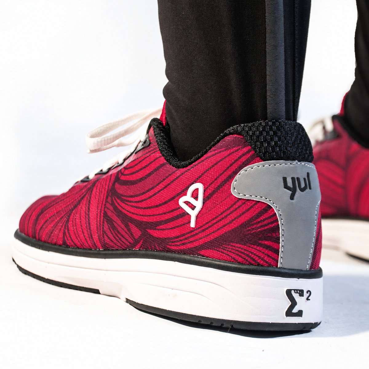 YUL Crimson Red road shoes, rear three-quarter view.